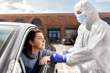medicine, quarantine and pandemic concept - doctor or healthcare worker in protective gear or...