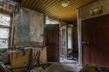 open door in a dilapidated farmhouse