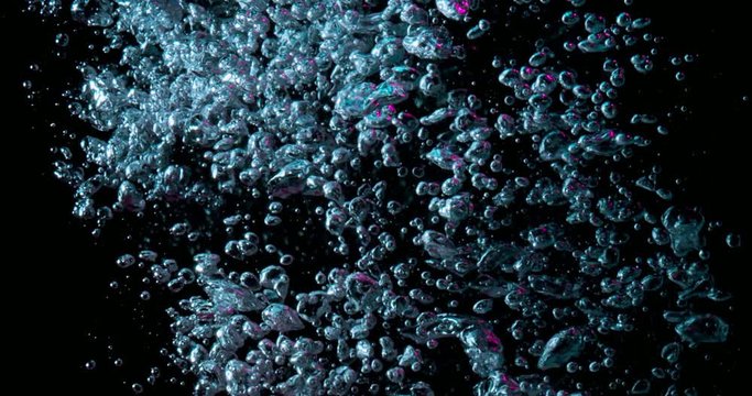 blue bubbles in the dark water.