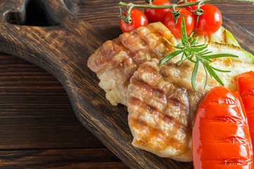 grilled pork fillet with vegetables.