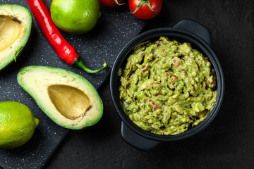 Bowl of guacamole with fresh ingredients - 353056905
