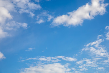 Naklejka na ściany i meble Blue sky with white clouds, background