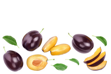 fresh purple plum and half with leaves isolated on white background with clipping path and copy spase for your text. Top view. Flat lay