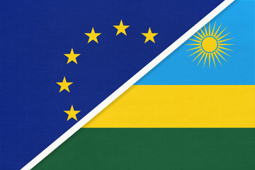 European Union or EU and Rwanda national flag from textile. Symbol of the Council of Europe association.