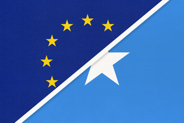 European Union or EU and Somalia national flag from textile. Symbol of the Council of Europe association.