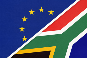 European Union or EU and South Africa national flag from textile. Symbol of the Council of Europe association.