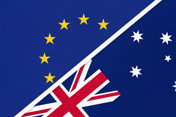European Union or EU and Australia national flag from textile. Symbol of the Council of Europe association.