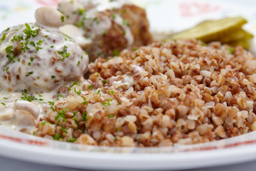 buckwheat with cutlets and cucumber