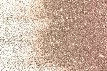 Rose gold glitter on white background