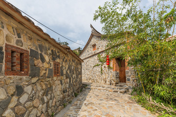 Fototapeta na wymiar Exterior view of traditional ancient Chinese village, with old architecture courtyard in rural areas