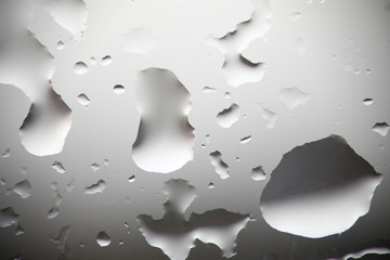 Abstract set with water drop glass on gray background.