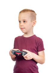 Young handsome caucasian boy plays computer games with joystick isolated on white background - 353064798