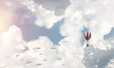 Flying hot air balloon in the air.