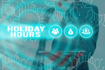 Text sign showing Holiday Hours. Business photo showcasing employee receives twice their normal pay...