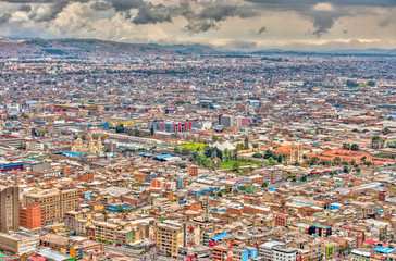 Fototapeta na wymiar Bogota cityscape in cloudy weather, HDR Image