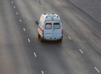 Ambulance car moving on the road