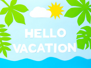 Fototapeta na wymiar A words HELLO VACATION of paper cut letters on a blue summer background