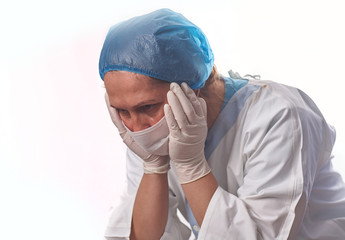 Portrait of a female doctor/surgeon feeling down, exhausted, frustrated, very tired, .... on white background