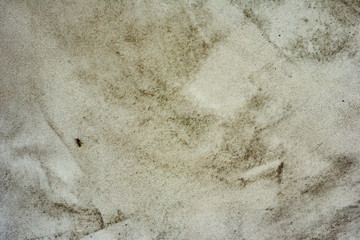 Texture of a concrete wall with cracks and scratches which can be used as a background