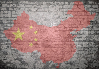 Grunge decayed faded brick wall background with the map flag of the Peoples Republic of China