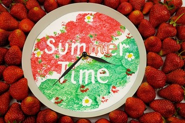 Summer time watch dial and fresh strawberries