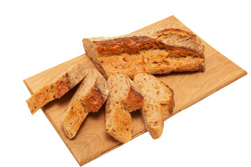 French buckwheat loafs sliced into pieces on a wooden board