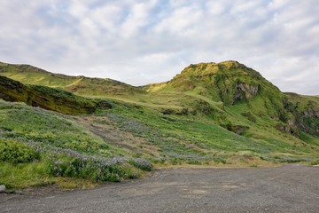 The green hills above Vik i Myrdal villange in Southern Iceland during beautiful sunset