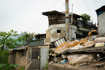 Seoul's last shanty town. Known as Village 104 it is only half filled with residents who live among empty neighbors waiting for demolition. 