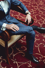 Fototapeta na wymiar Portrait of a businessman sitting in arm chair