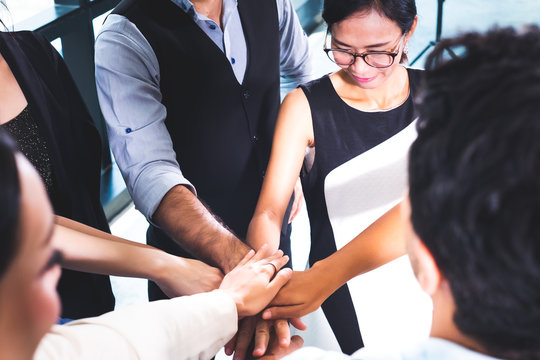 Business people join hand together to success deal, congrats in deal