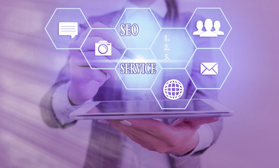 Text sign showing Seo Service. Business photo showcasing techniques and procedures to increase the...