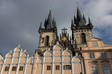 Tyn Cathedral in Prague with beautiful facades in the foreground at the famous old town square