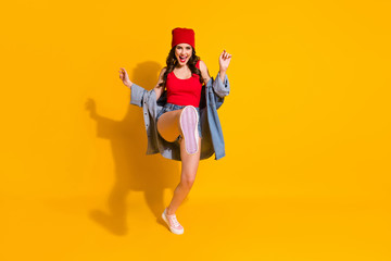 Full length body size view of her she nice attractive lovely pretty glamorous cheerful cheery wavy-haired girl dancing having fun isolated over bright vivid shine vibrant yellow color background