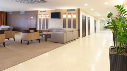 Interior of hotel corridor and waiting room.