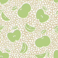 Green apples with a white outline on a white-brown background of small circles