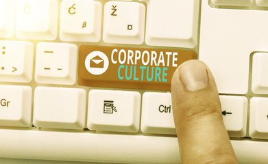 Conceptual hand writing showing Corporate Culture. Concept meaning pervasive values and attitudes...