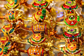 Display of gold decorative ornamental camels for sale at the souq market in Dubai