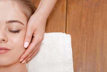 Obraz na płótnie Canvas Beauty day in salons with spa treatments. Hands do massage for girl with perfect skin