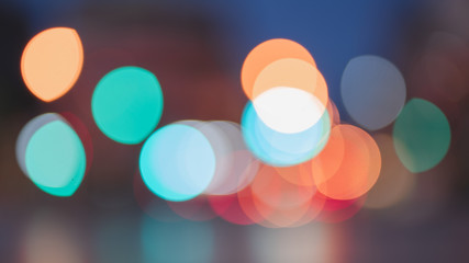 Night traffic light bokeh on road