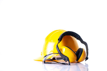 safety equipment for construction. Security tools for worker and Engineering. Yellow hard hat, Earphones, leather glove, safety glasses