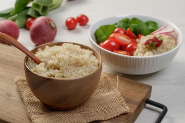Superfood quinoa salad with tomato,radish and corn salad.