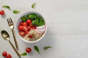 Superfood quinoa salad with tomato,radish and corn salad. Free space for your text.