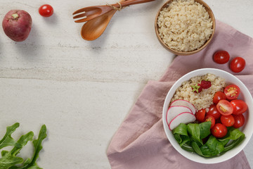 Health food quinoa salad with tomato,radish and corn salad.