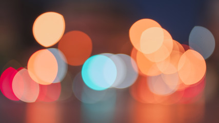 Night traffic light bokeh on road