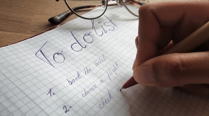 Fototapeta premium hand writing vacation to do list