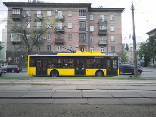 Kyiv, Ukraine - May 2020: New low-floor yellow trolleybus Bogdan on the streets of Kiev.