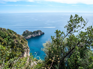 Promontory and tower of Capo di Conca in the municipality of Conca dei Marini. Coastal tower on the mediterranean sea. Amalfi Coast, Salerno, Campania, Italy