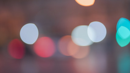 Night traffic light bokeh on road