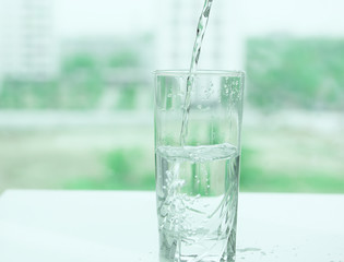 transparent glass of water with air bubbles
