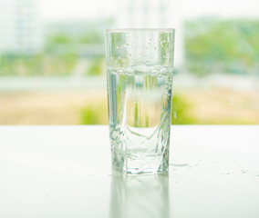 transparent glass of water with air bubbles